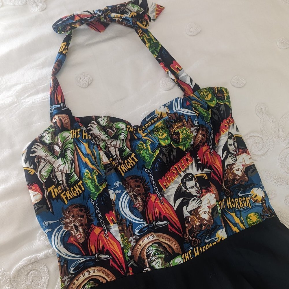 Vintage-Inspired Black Midi Dress with Multi-Color Horror Print